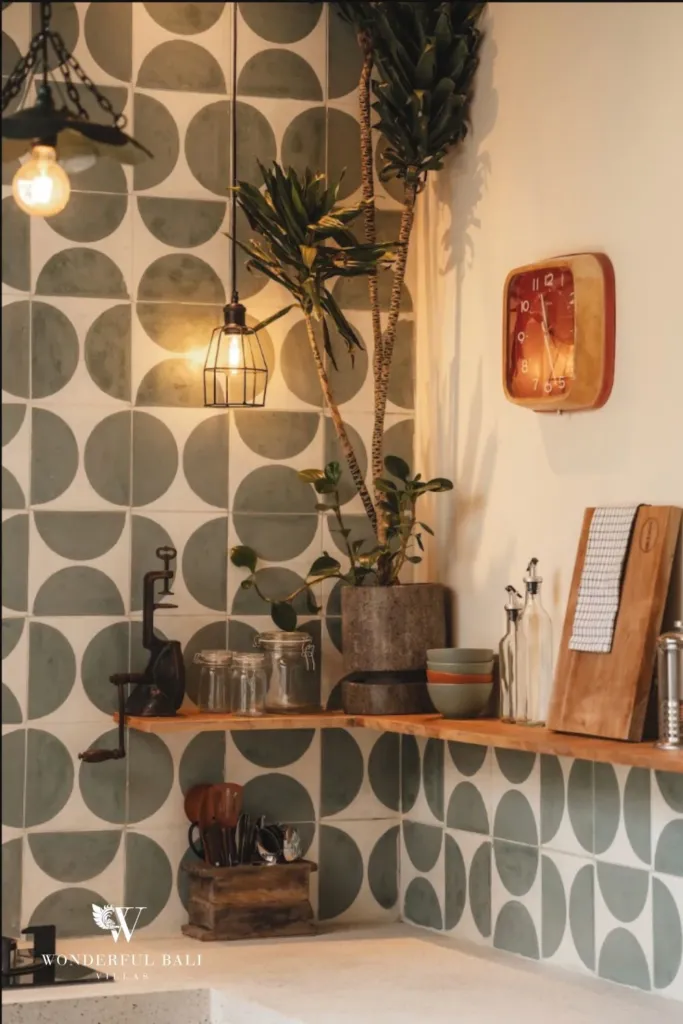 2BR villa for rent in Berawa, Canggu — kitchen, open timber shelf with jars, boards and utensils above the tiled counter