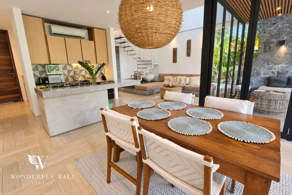 4BR villa for rent in Berawa, Canggu — living room, timber dining table set for six