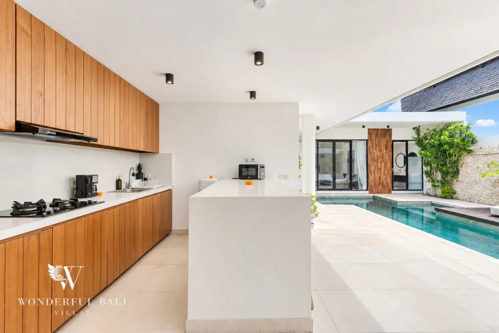 3BR villa in Berawa, Canggu, Bali — kitchen, the kitchen looking out to the pool