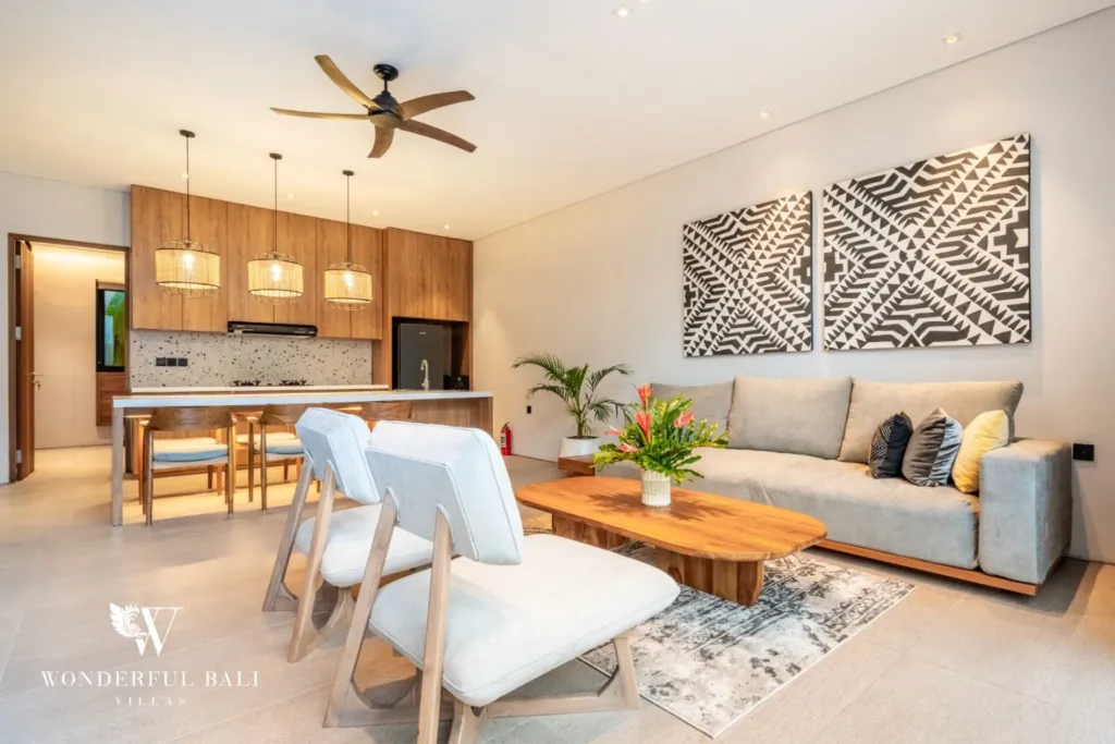 3BR villa for rent in Seminyak — living room, open-plan living, dining and kitchen under a pitched ceiling
