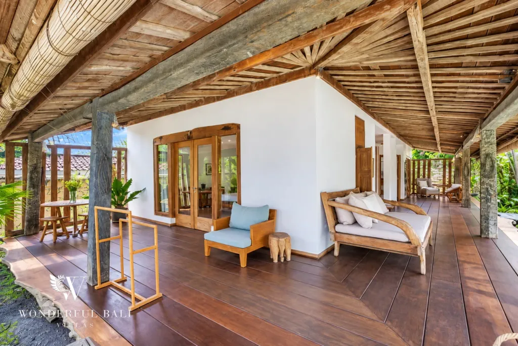 5BR villa for rent in Umalas — terrace, daybed and armchair on the covered bedroom veranda