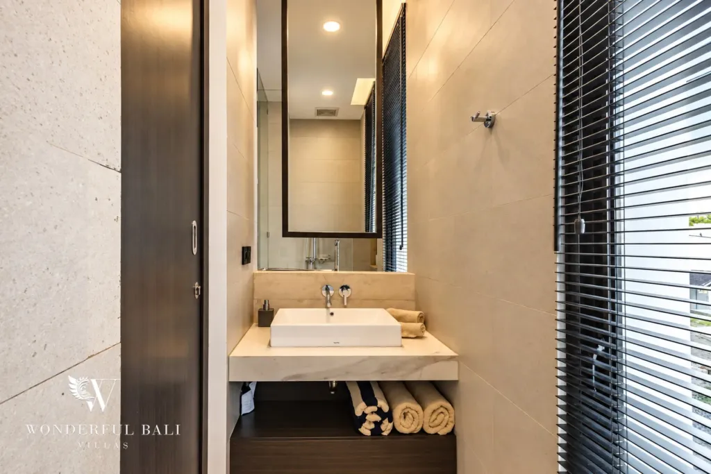 3BR villa for rent in Munggu — bathroom vanity with stone basin