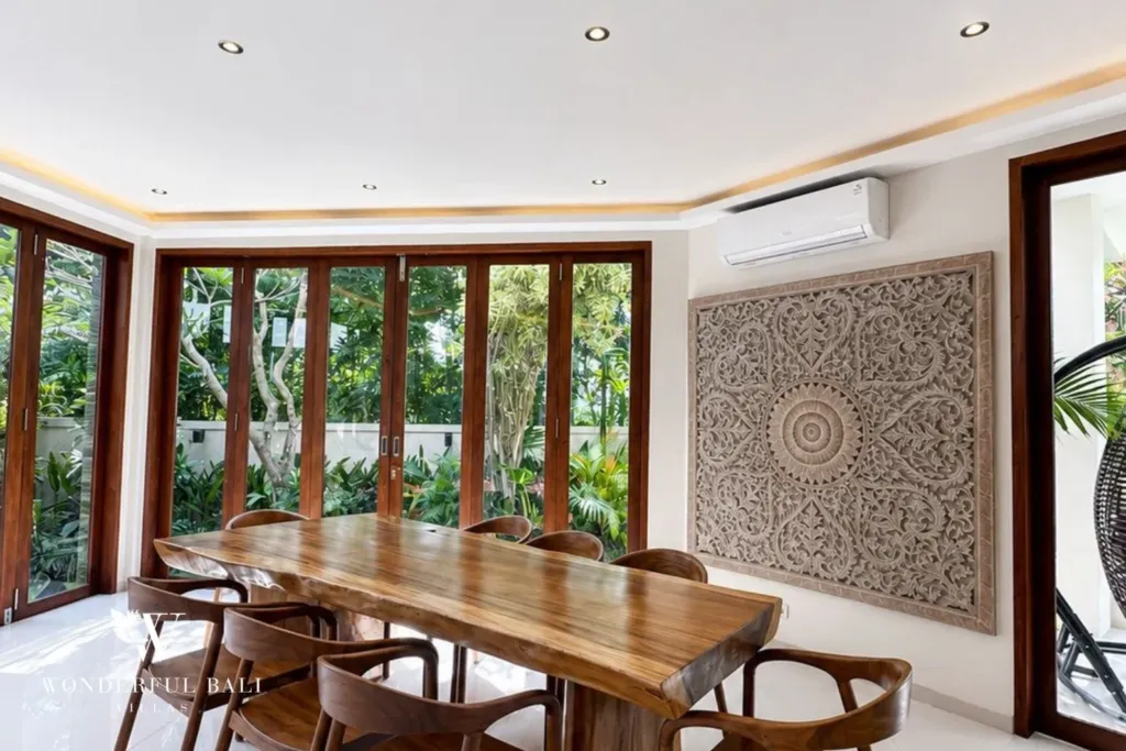 4BR villa for rent in Padonan, Canggu — dining, dining room in the bay window with a carved panel