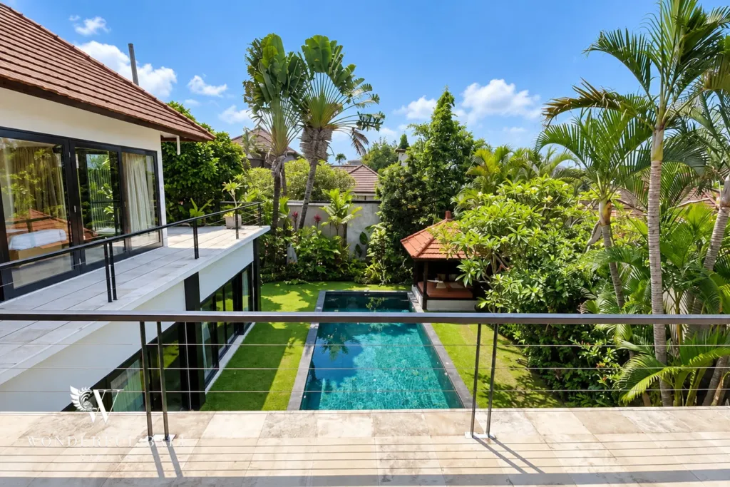 4BR villa for rent in Umalas, Bali — terrace, view over the pool and garden from the upstairs terrace