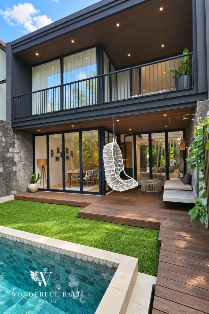 4BR villa for rent in Berawa, Canggu — exterior, the villa, lawn and pool from the garden