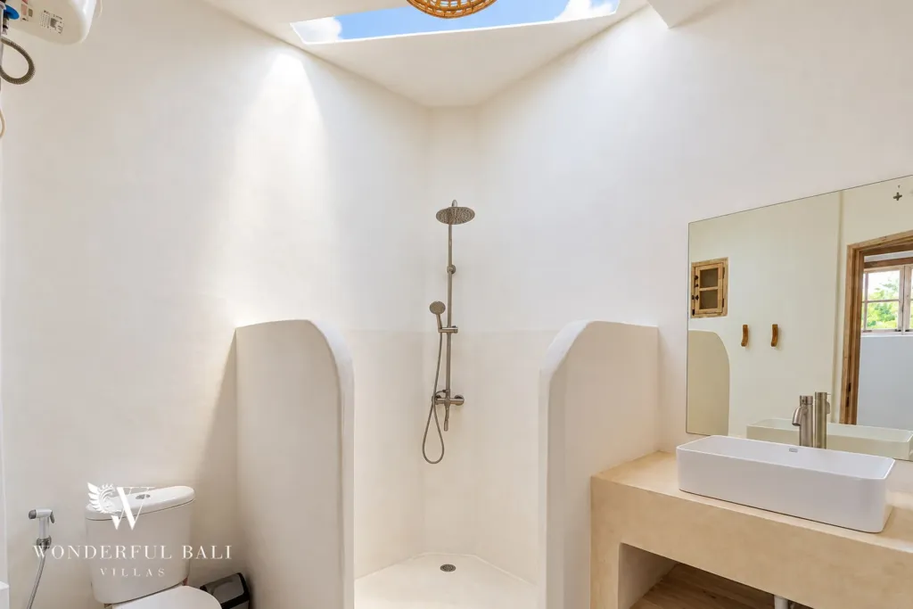 4BR villa for rent in Umalas, Bali — bathroom, en-suite bathroom in white plaster with timber detailing