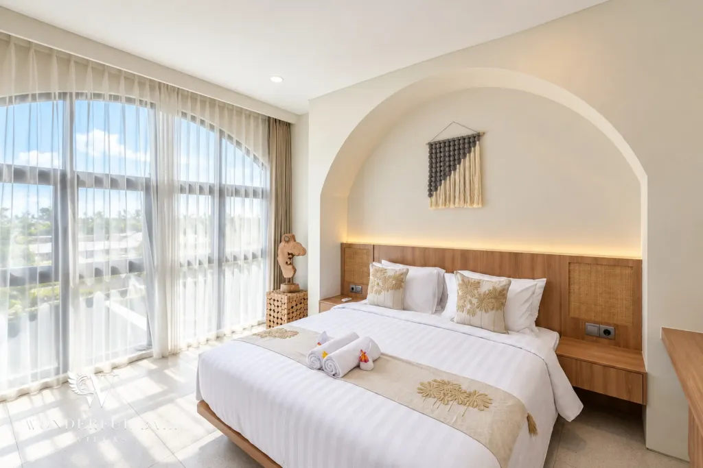 3BR villa for rent in Berawa, Canggu — bedroom, bedroom beside a tall curtained window