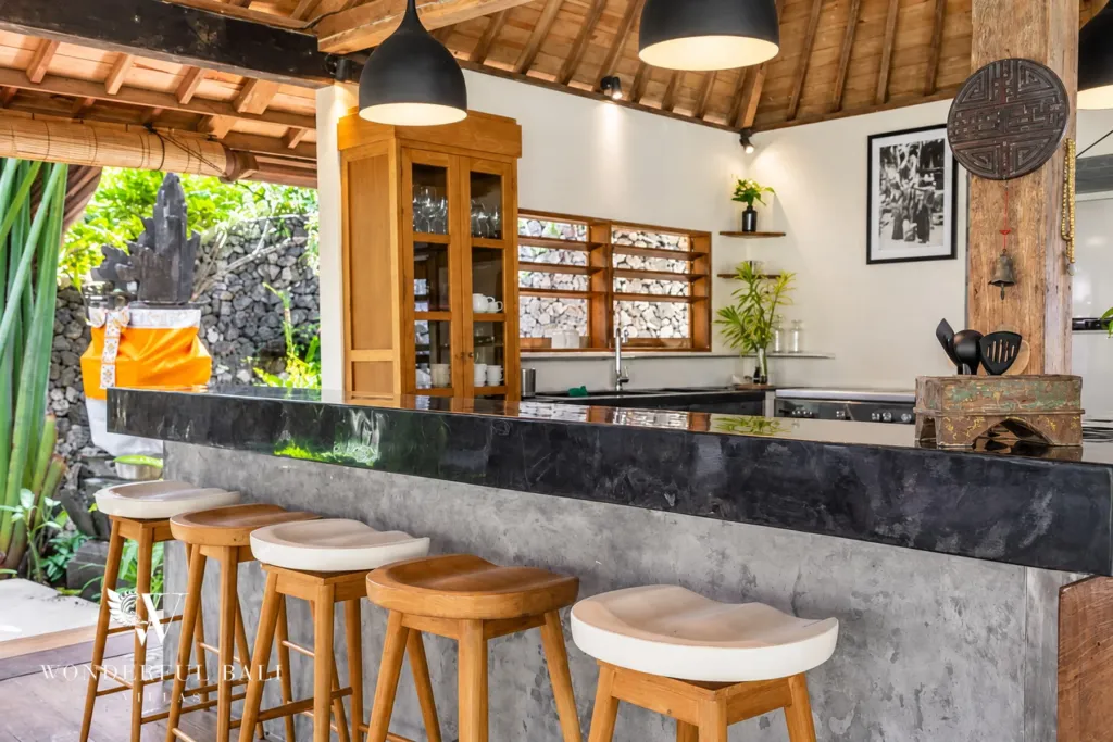 5BR villa for rent in Umalas — kitchen, breakfast bar, glass-front cabinets and range cooker