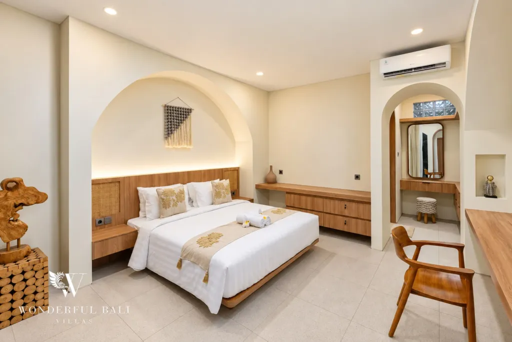 3BR villa for rent in Berawa, Canggu — bedroom, bedroom with a timber ledge and mirror by the en-suite