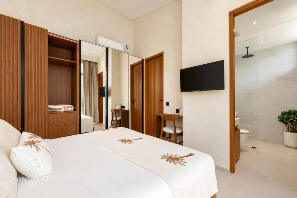 2BR villa for rent in Padonan, Canggu — bedroom, bedroom with a view into the ensuite rain shower