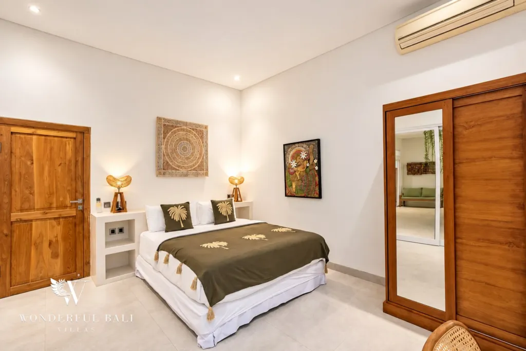 5BR villa for rent in Bumbak, Umalas — bedroom, bedroom with a full-height mirrored wardrobe and long dresser