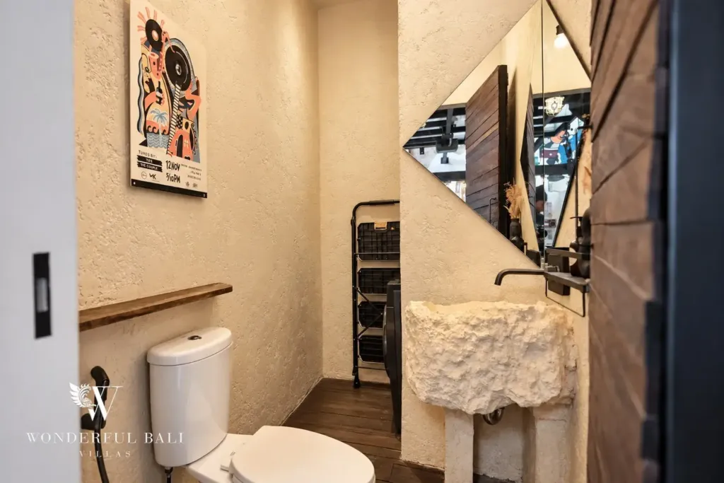 3BR villa for sale in Berawa — bathroom, guest WC with a carved stone basin