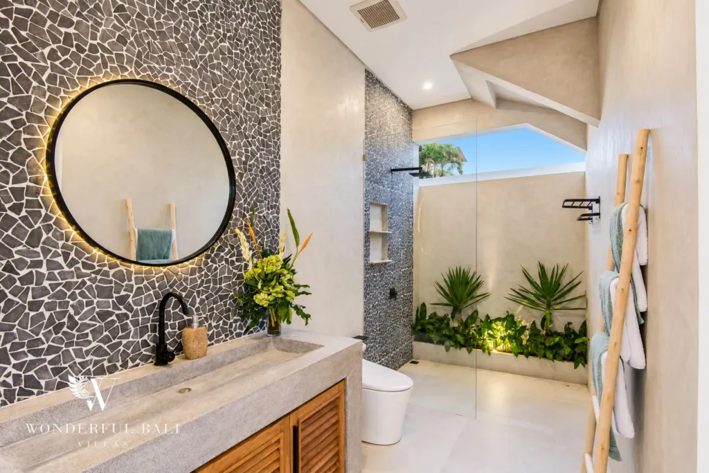 4BR villa for rent in Cemagi — bathroom, mosaic wall, backlit mirror and garden rain shower