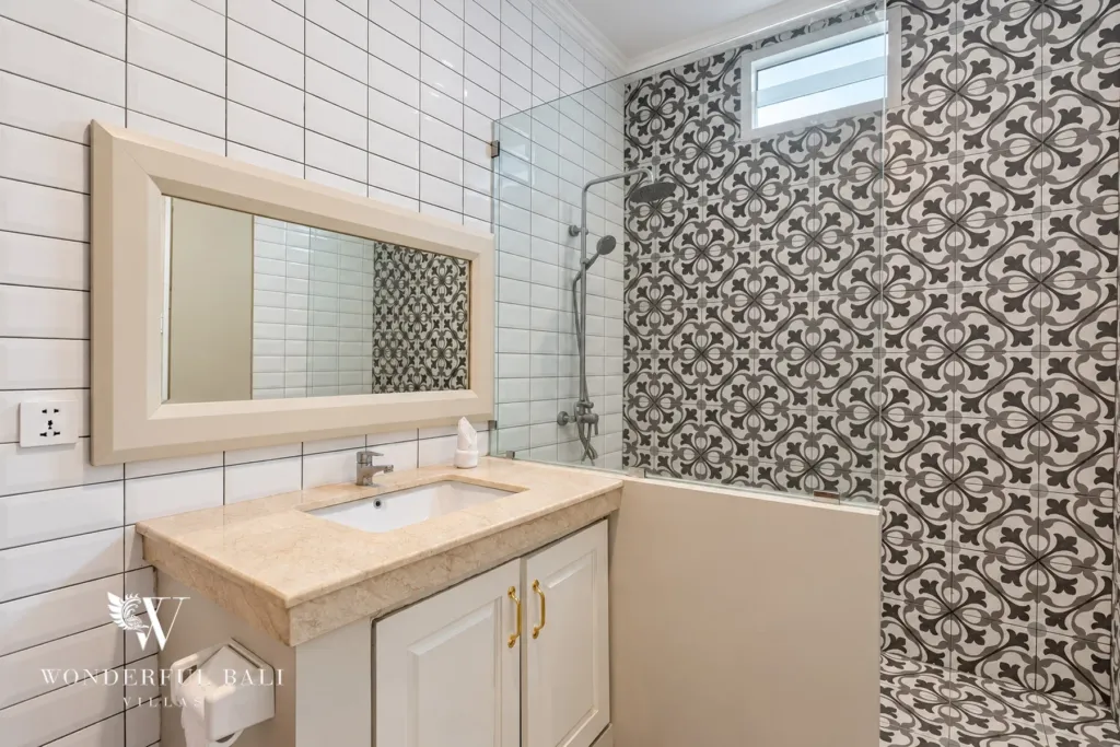 5BR villa for sale in Pererenan — bathroom with patterned tiles and walk-in shower