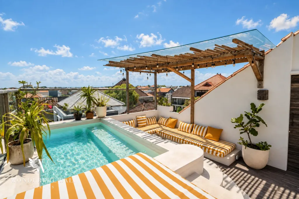 3BR villa for sale in Berawa — rooftop, rooftop jacuzzi and striped lounge over the Berawa rooftops