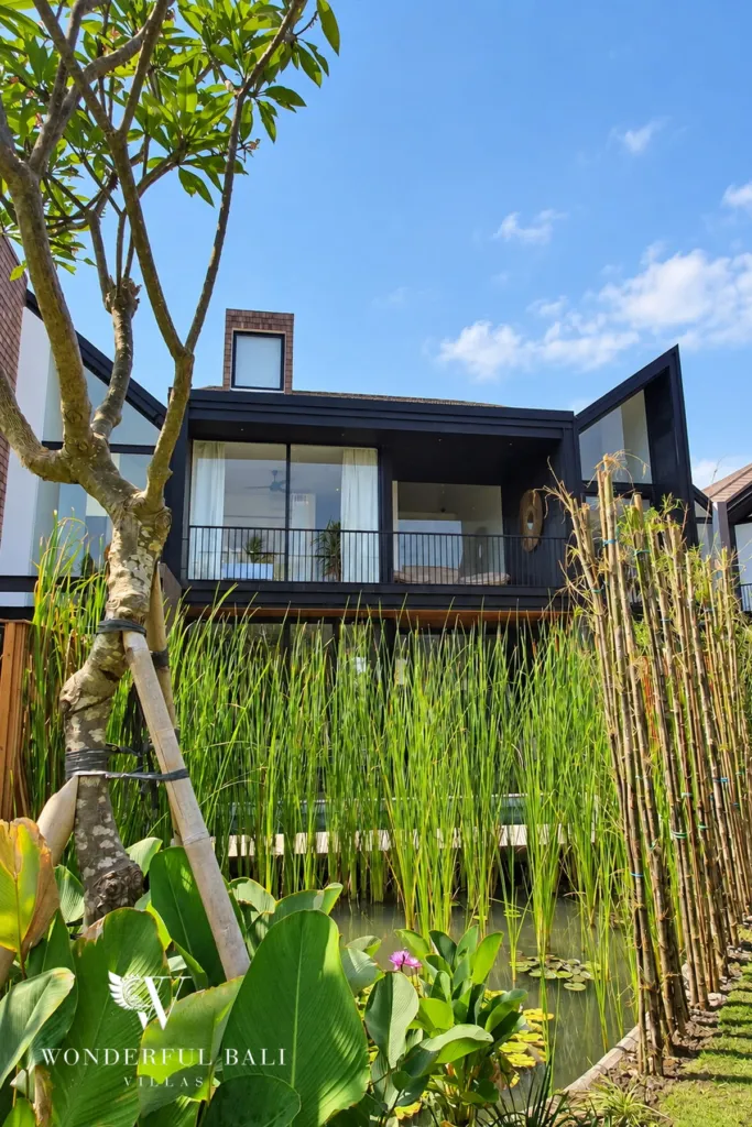 4BR villa for rent in Berawa, Canggu — exterior, the villa seen across the planting