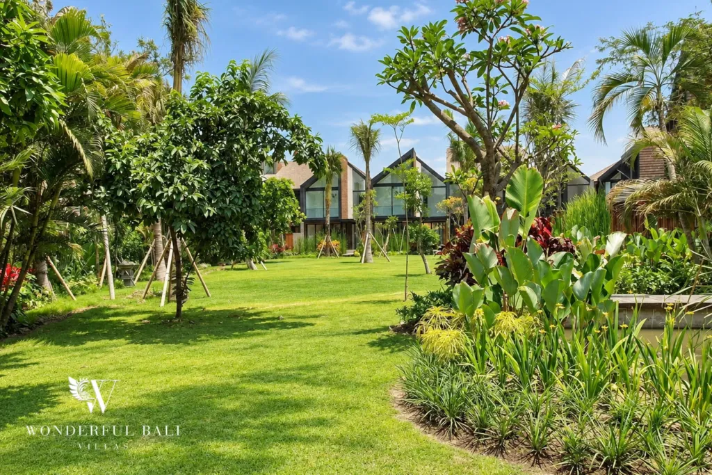 4BR villa for rent in Berawa, Canggu — exterior, landscaped lawn and planting in the estate grounds