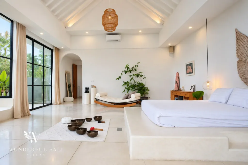 5BR villa for rent in Seseh, Bali — bedroom, platform bed and daybed in the double-height master bedroom