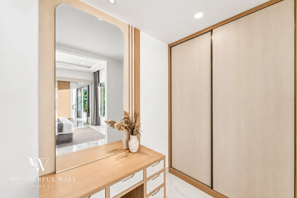 2BR villa for rent in Kaba-Kaba, Bali — bedroom, walk-in closet with a dressing table and fitted wardrobes