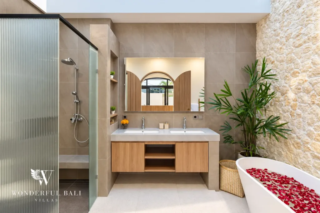 3BR villa for rent in Berawa, Canggu — bathroom, en-suite with a double vanity, shower and freestanding tub