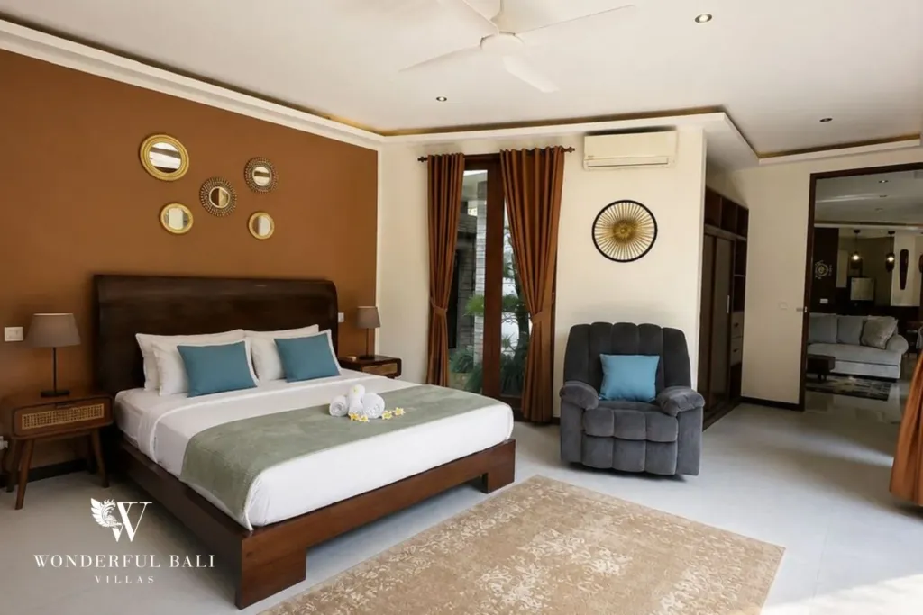 4BR villa for rent in Padonan, Canggu — bedroom 4, ground-floor bedroom with mirrors on the feature wall
