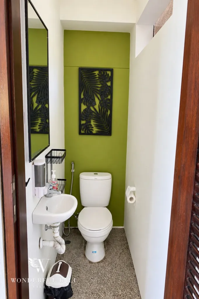3BR villa for sale in Jimbaran — bathroom, guest WC with a green accent wall