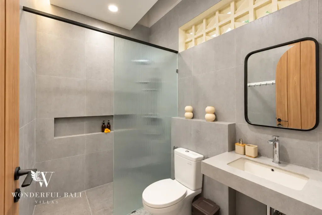 3BR villa for rent in Berawa, Canggu — bathroom, en-suite with a walk-in shower and arched mirror
