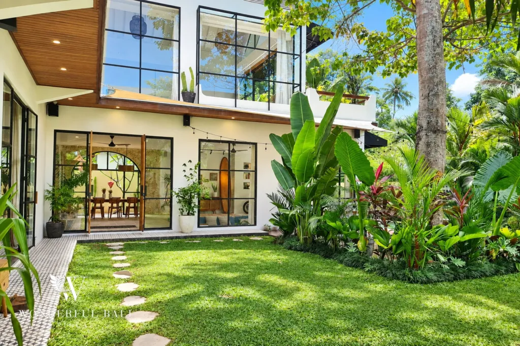 5BR villa for rent in Seseh, Bali — garden, planted courtyard between the two wings of the villa