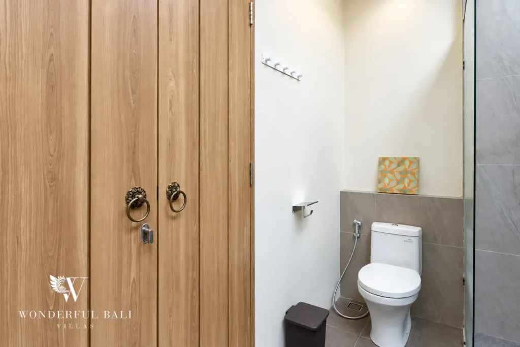 3BR villa for rent in Berawa, Canggu — bathroom, en-suite behind arched timber doors