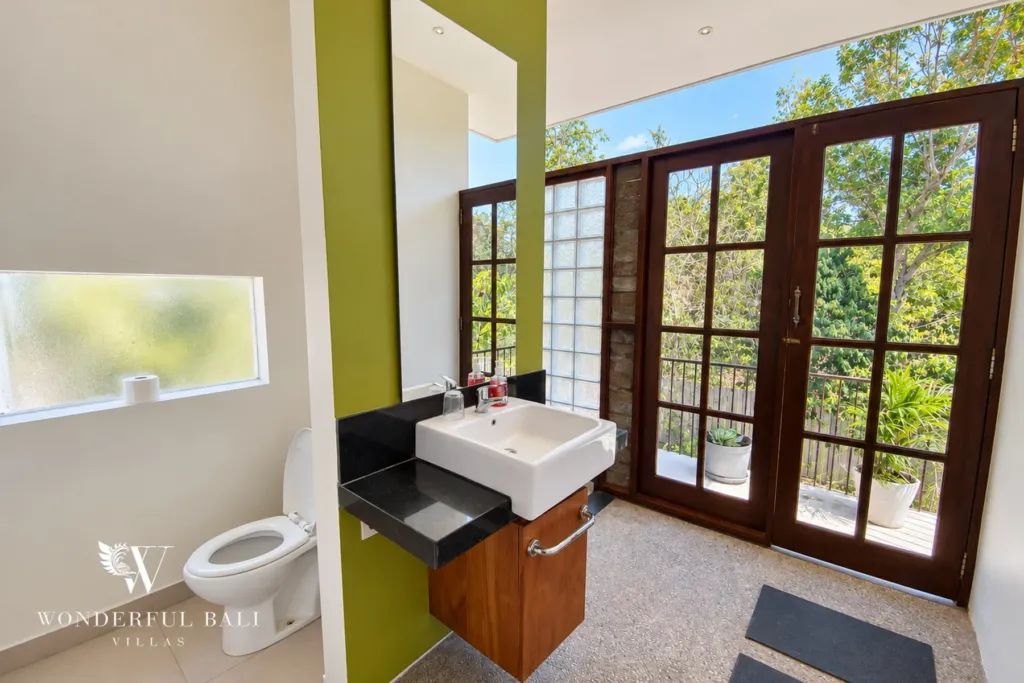3BR villa for sale in Jimbaran — bathroom, bathroom vanity with glass doors to a terrace