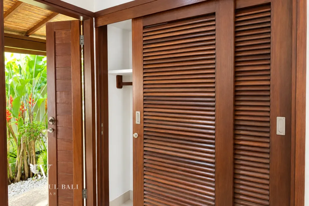 3BR villa for rent in Padonan, Canggu — bathroom, louvred timber doors leading through to the garden bathroom