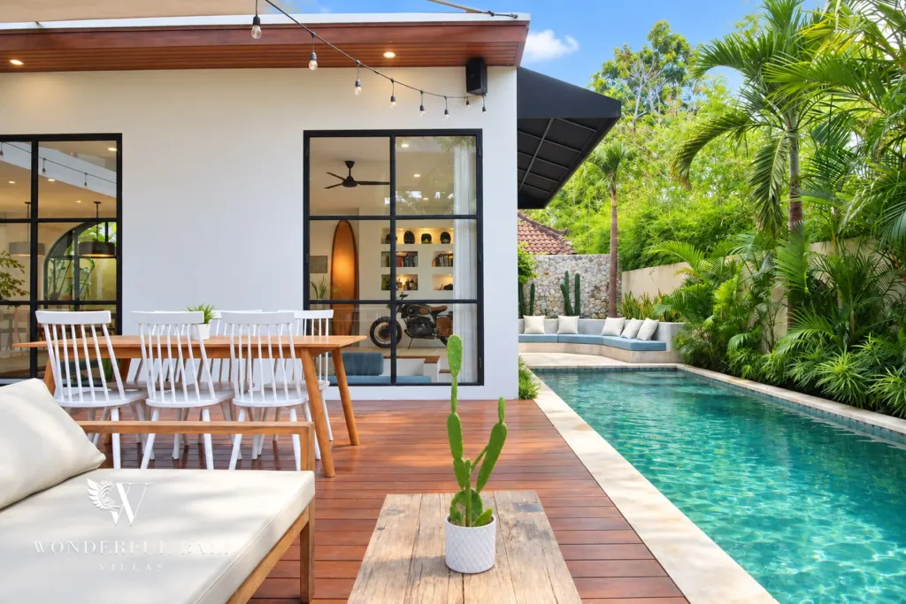 5BR villa for rent in Seseh, Bali — pool, covered terrace with a dining table beside the pool