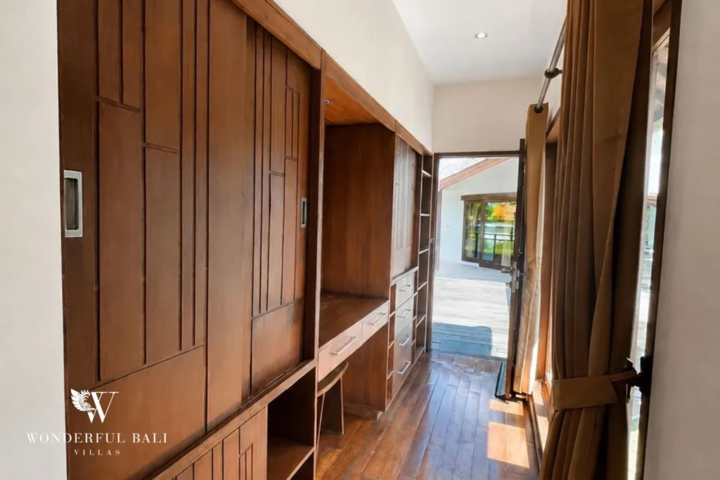 4BR villa for rent in Padonan, Canggu — dressing, fitted timber wardrobes along the landing