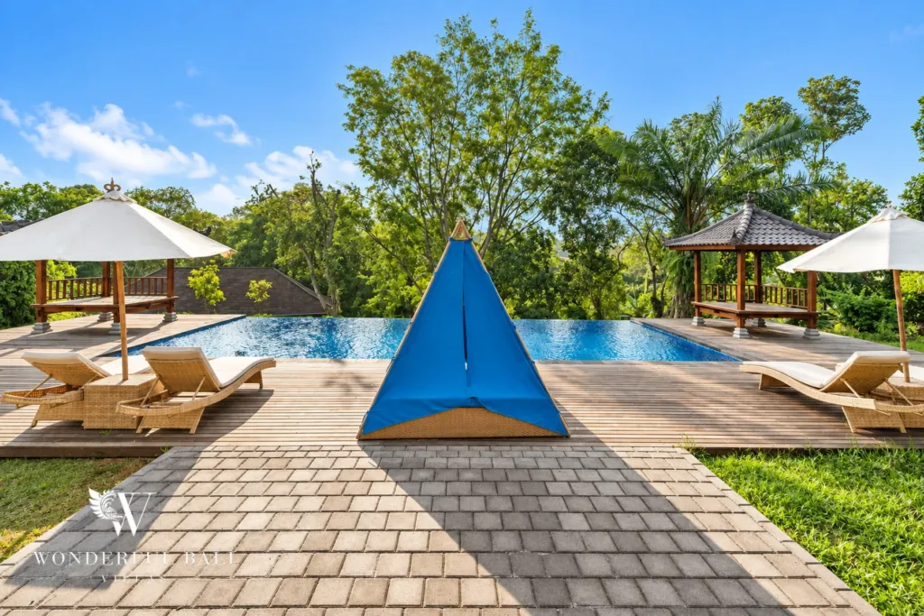 2BR villa for rent in Kaba-Kaba, Bali — pool, the shared pool and the landscaped estate gardens