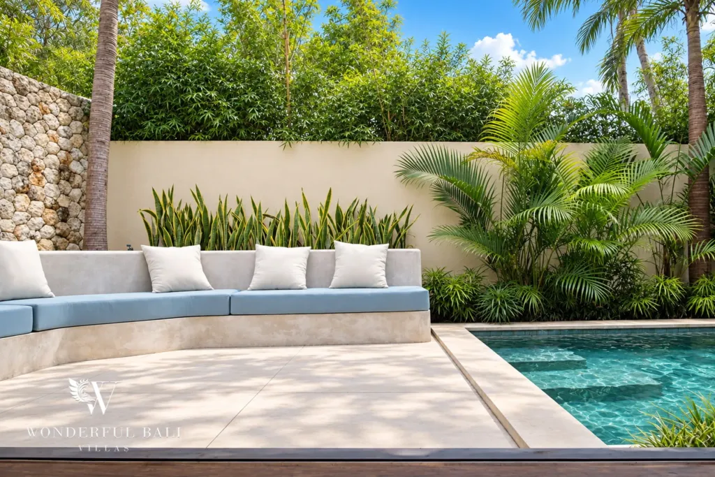 5BR villa for rent in Seseh, Bali — pool, built-in bench seating set into the terrace at the pool edge