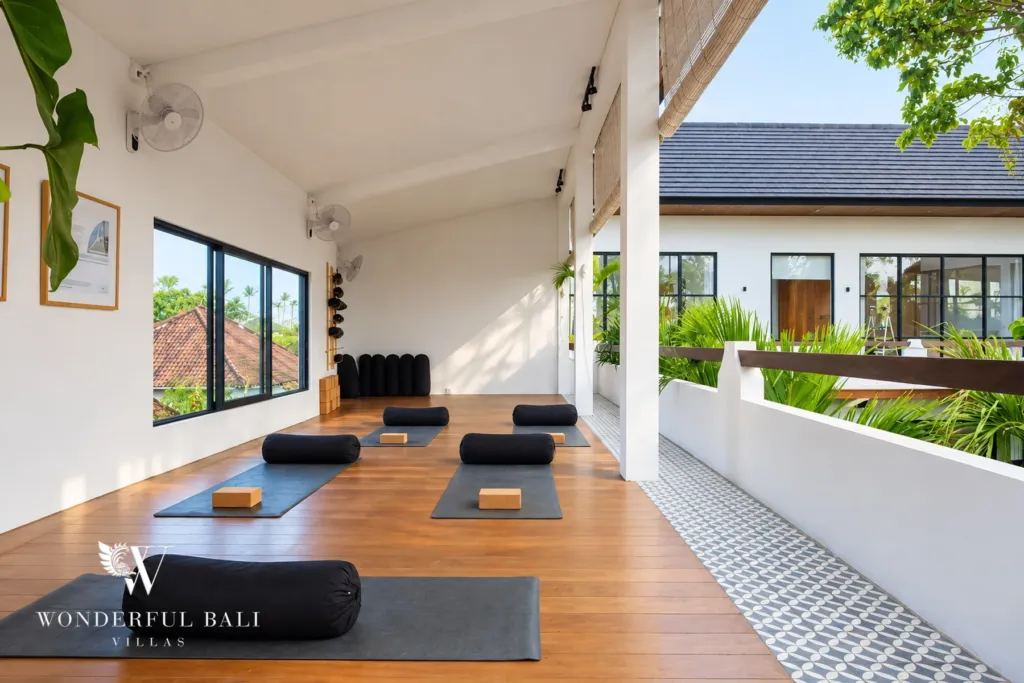 5BR villa for rent in Seseh, Bali — terrace, covered terrace laid out with yoga mats and bolsters