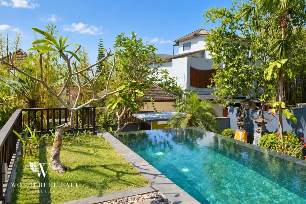 3BR villa for sale in Jimbaran — pool, pool and lawn in the tropical garden
