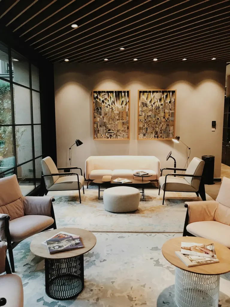 Lounge seating with armchairs, a sofa and framed artwork