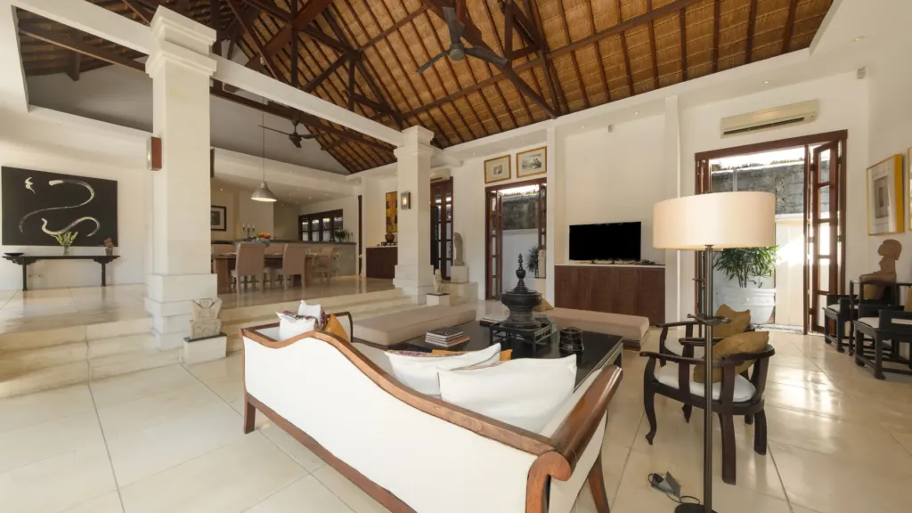 Living pavilion under a high pitched alang-alang roof at Villa V Seminyak