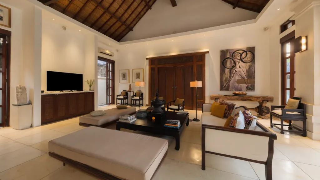 Second living room with a Smart TV and daybeds at Villa V Seminyak