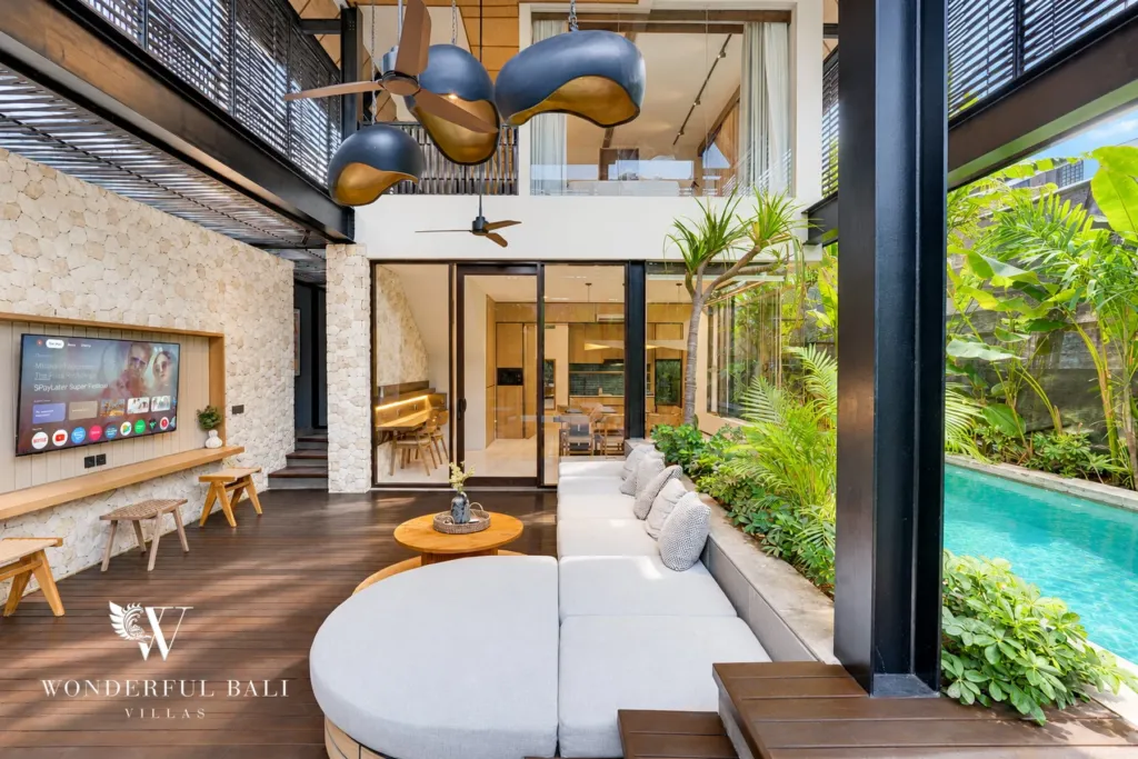 4BR villa for sale in Padang Linjong, Canggu — sunken living deck opening onto a private pool and tropical garden