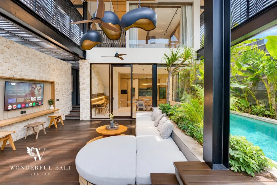 4BR villa for sale in Padang Linjong, Canggu — sunken living deck opening onto a private pool and tropical garden