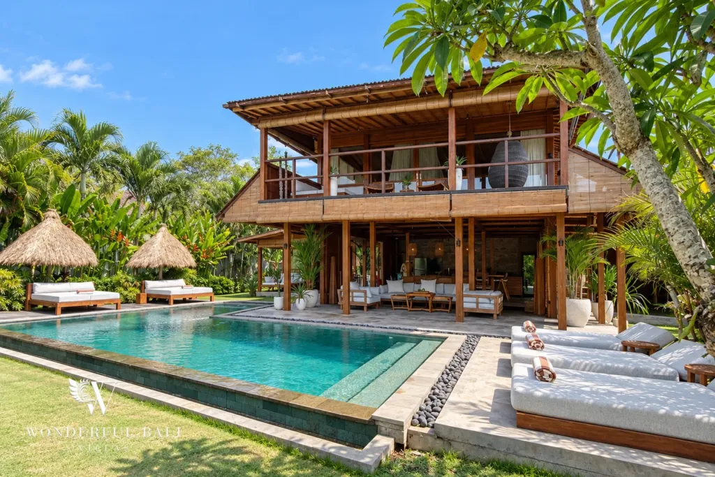3BR villa Seseh, Canggu — teakwood villa with private pool and thatched pavilions in a tropical garden near the beach