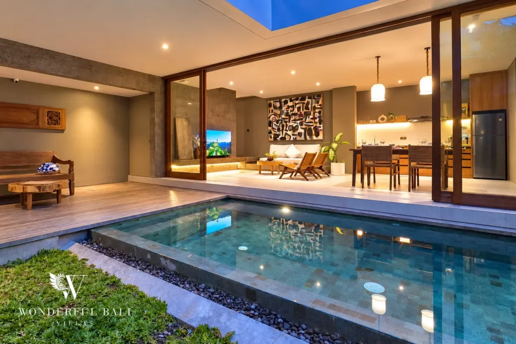 2BR villa long term rental Pererenan — pool courtyard and living area at dusk