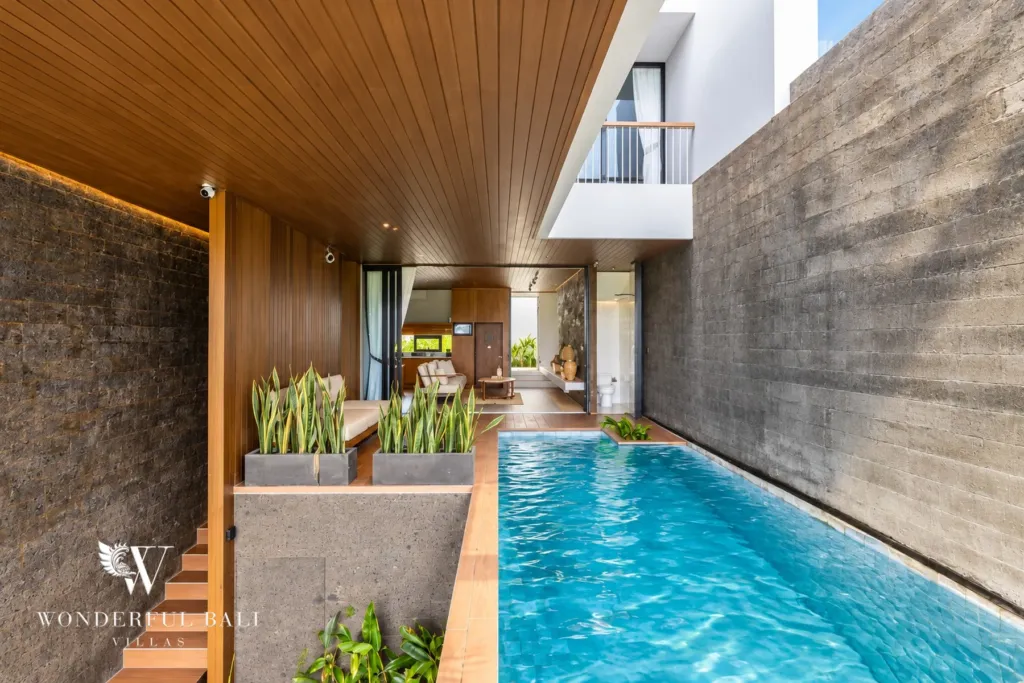 3BR villa long term rental Canggu — private infinity pool between stone walls