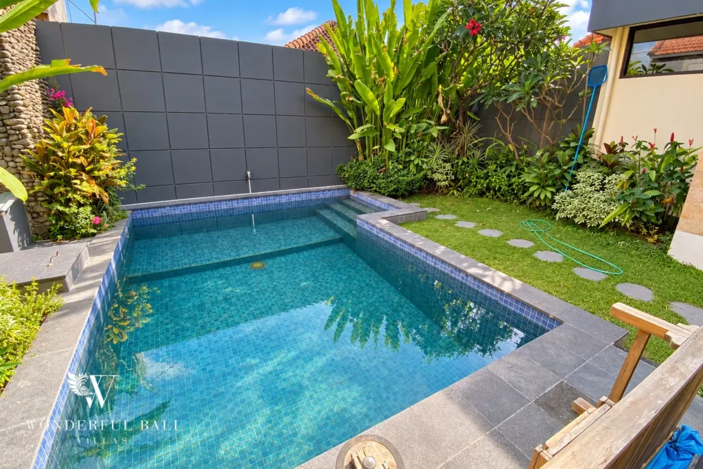 3BR villa for sale or rent in Sanur — private pool with mosaic tiles beside the tropical garden