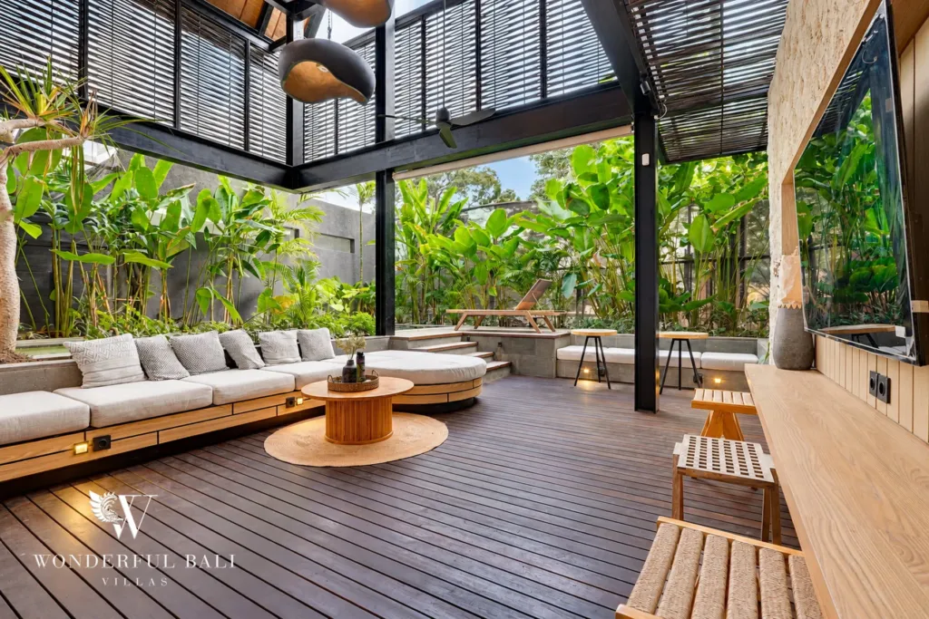 4BR villa for sale in Canggu — sunken lounge with built-in sofa beside the garden