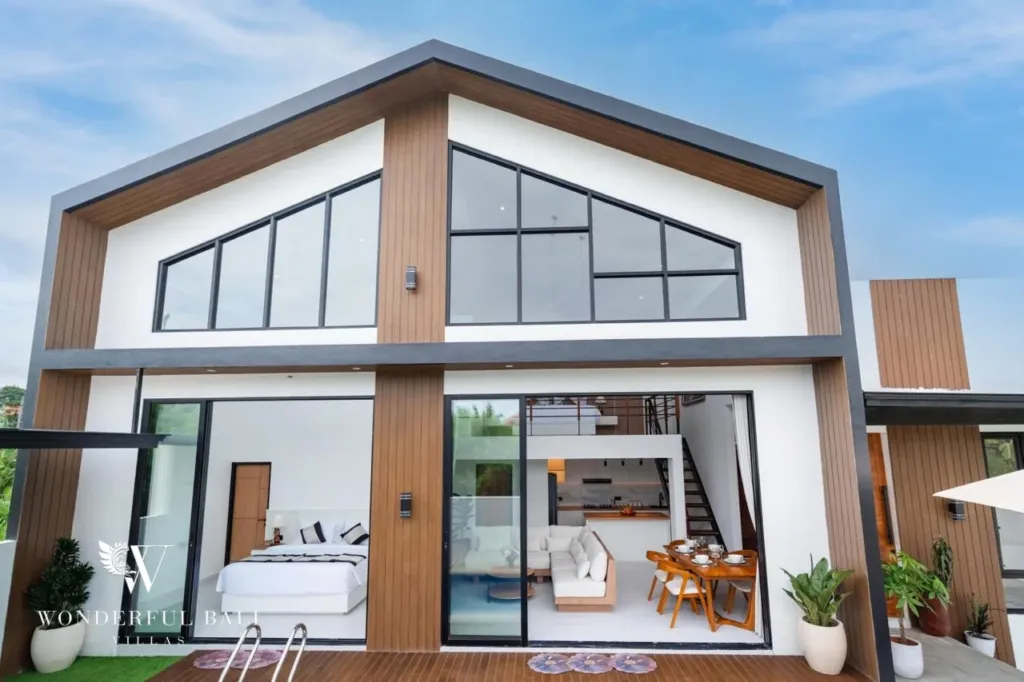 3BR villa for sale in Saba, Gianyar — gabled facade with timber cladding and glass doors to the living area