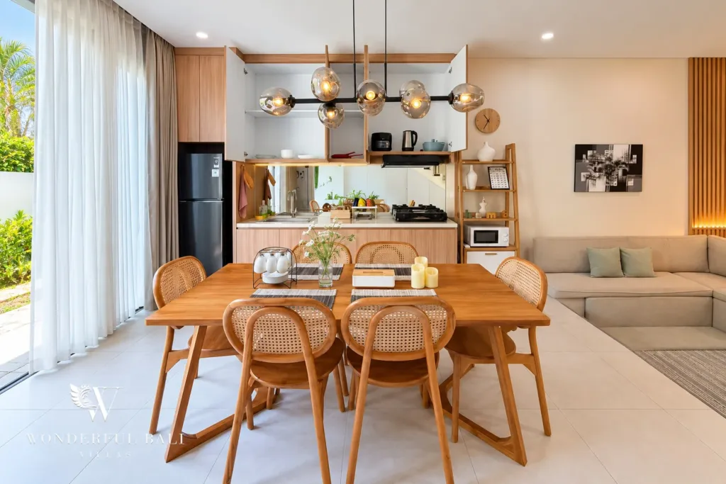 2BR villa for sale in Sanur — timber dining table for six and open kitchen