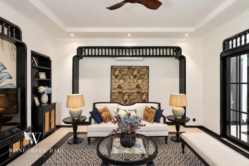 7BR villa for sale in Umalas — formal lounge with carved timber arch and patterned rug